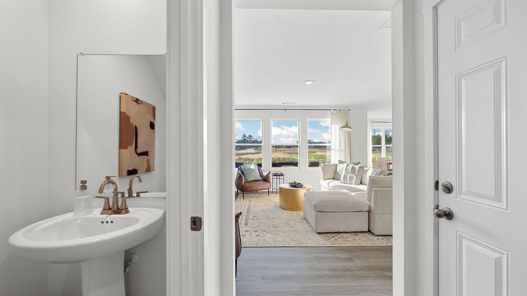 Furnished interior in a model home at Evergreen Landing in Rossville (Image 5).