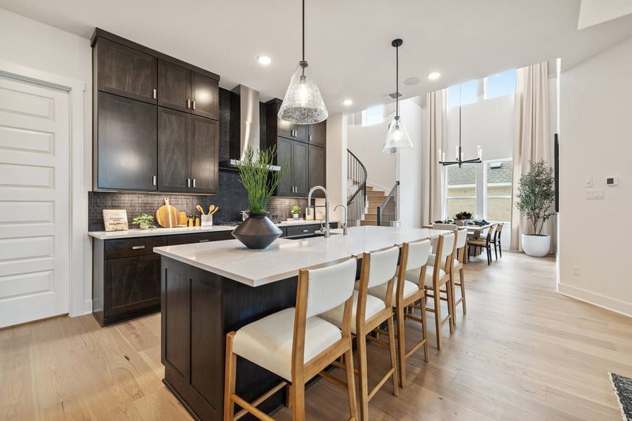 Furnished interior in a model home at Wolf Ranch in Georgetown (Image 12).