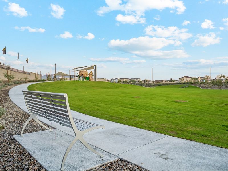 A bench on a grass field. A bench on a grass field.