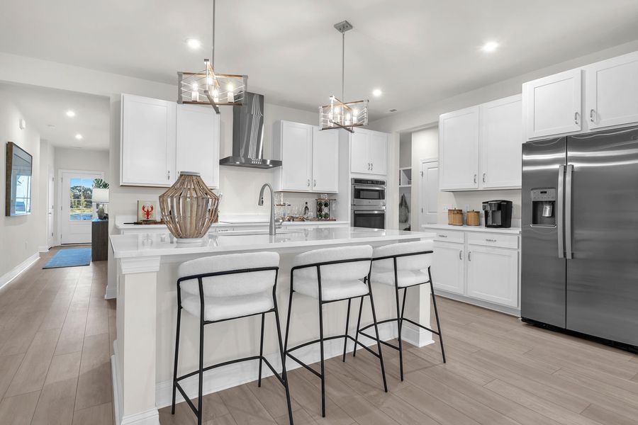 Enjoy designer-inspired kitchens with large center islands Enjoy designer-inspired kitchens with large center islands