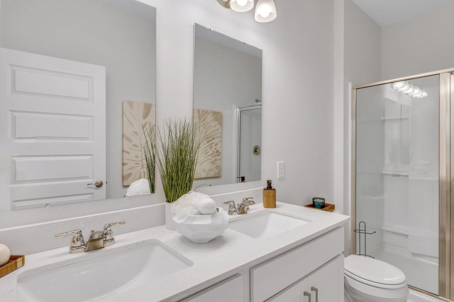 Furnished interior in a model home at Westbrook Retreat Villas at Savannah Quarters in Pooler (Image 25).