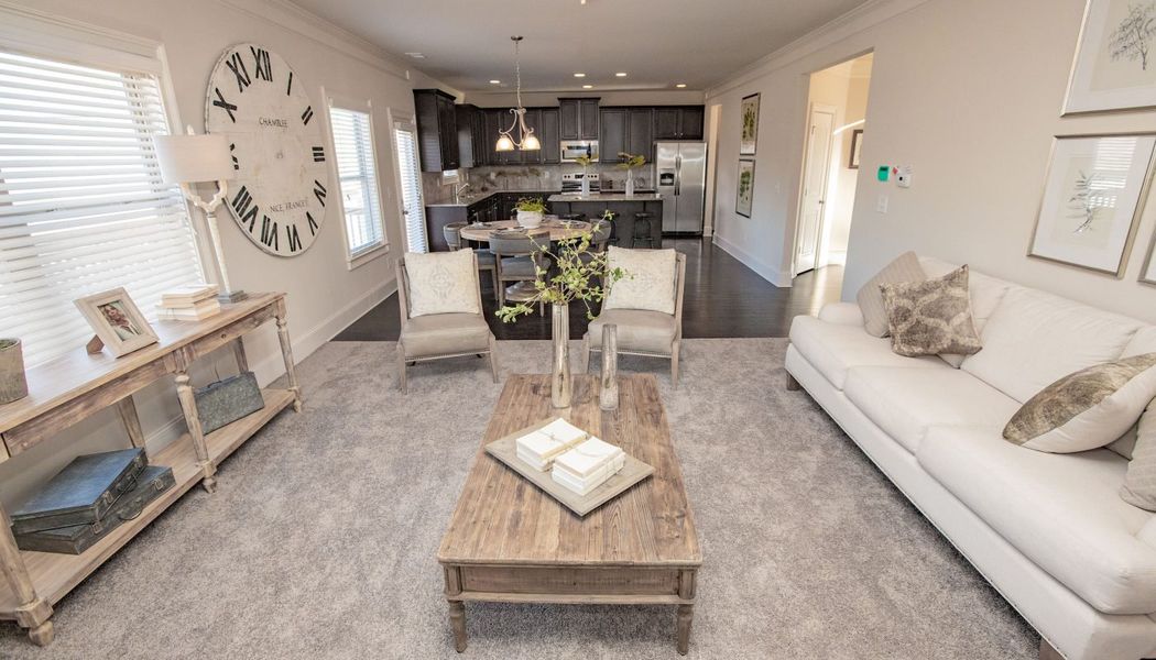 Furnished interior in a model home at Hampton Place Estates in Covington (Image 6).