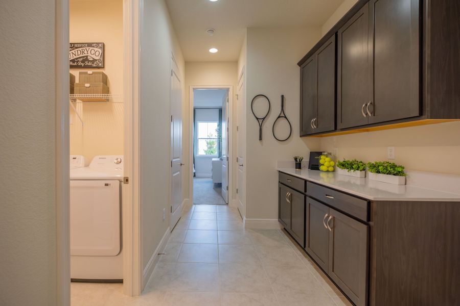 Furnished interior in a model home at Legends Preserve in Daytona Beach (Image 10).