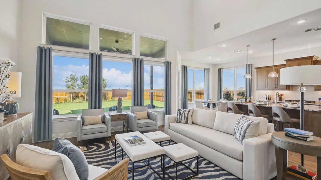 Experience Ridge Crossing's expansive living area with soaring ceilings and elegant flooring, perfect for upscale living. Experience Ridge Crossing's expansive living area with soaring ceilings and elegant flooring, perfect for upscale living.