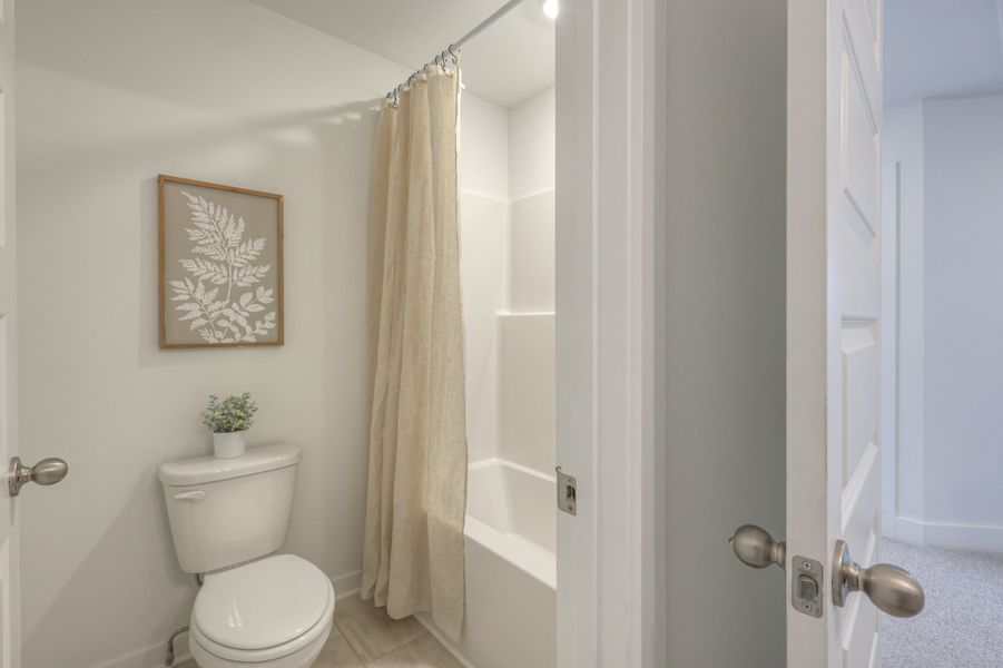 Furnished interior in a model home at Langford Farms in Gallatin (Image 46).