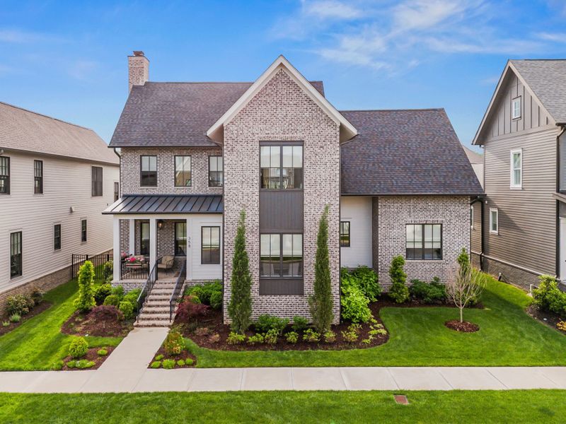 Street view of homes within the Stephens Valley master-planned community in Nashville, TN (Image 1).