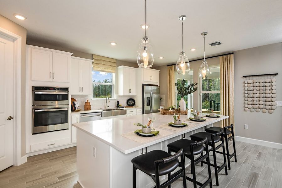 Furnished interior in a model home at Colbert Landings in Palm Coast (Image 6).
