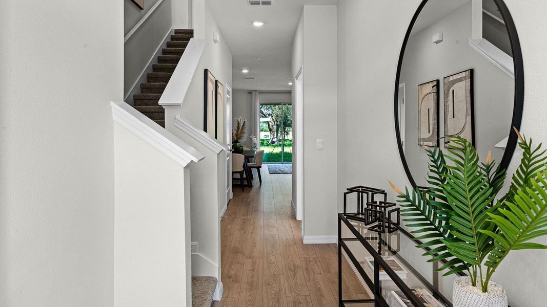 Furnished interior in a model home at Fish Lake Cove in Kissimmee (Image 3).