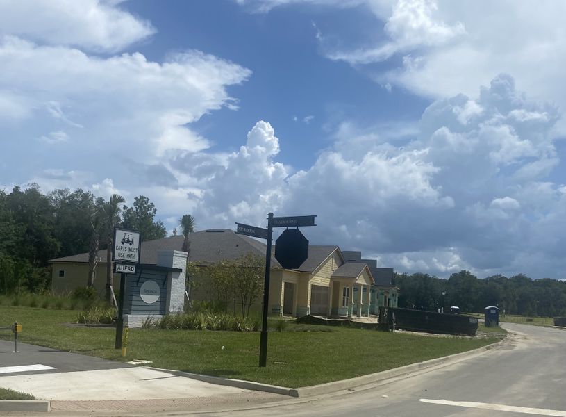 A serene neighborhood street in RiverTown - Springs by Mattamy Homes, St. Johns, FL, lined with charming new houses. A serene neighborhood street in RiverTown - Springs by Mattamy Homes, St. Johns, FL, lined with charming new houses.
