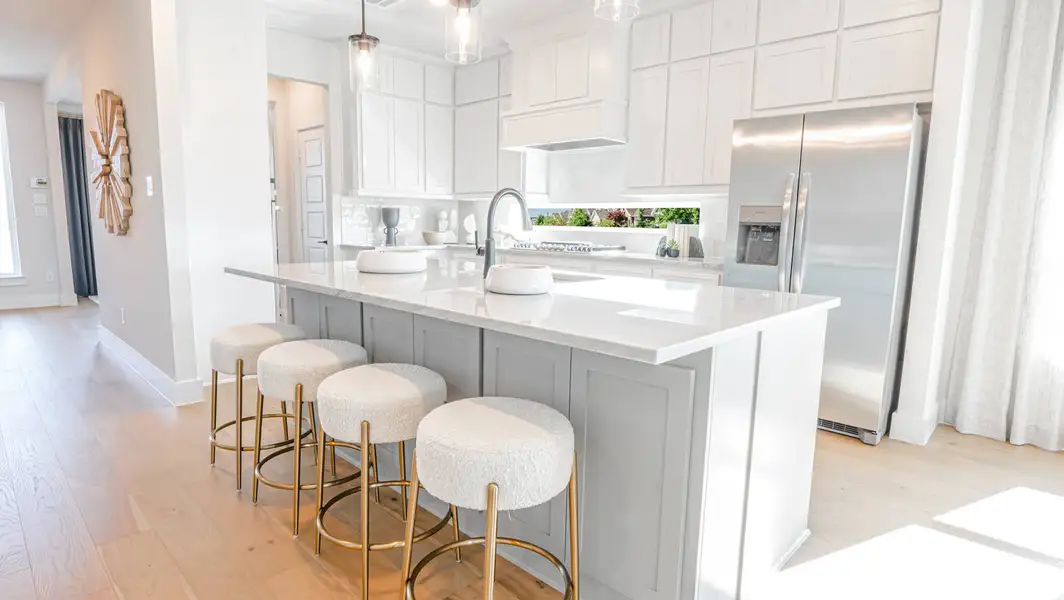 Furnished interior in a model home at Villages of Creekwood in Frisco (Image 2).