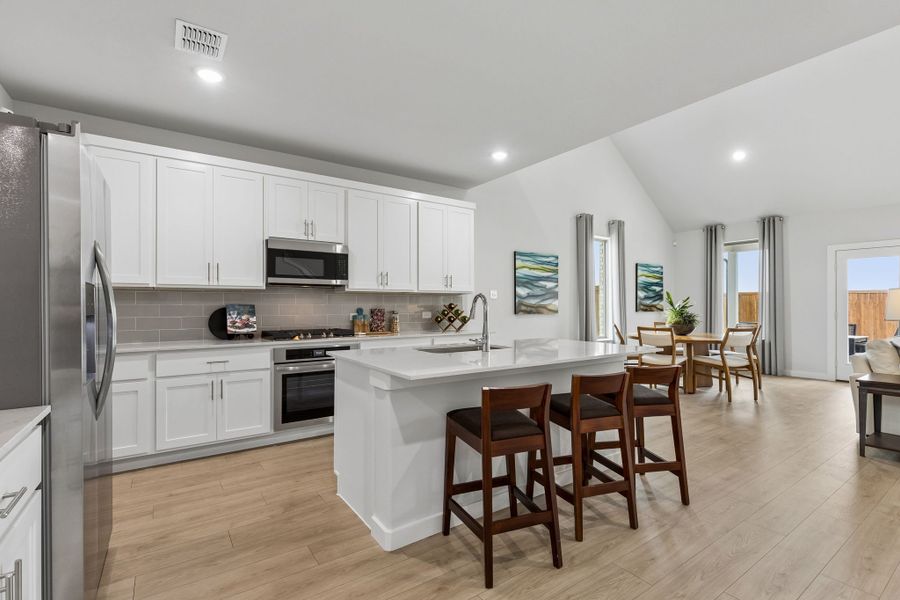 Kitchen in a Madero New Winters Model in Haslet TX by Trophy Signature Homes