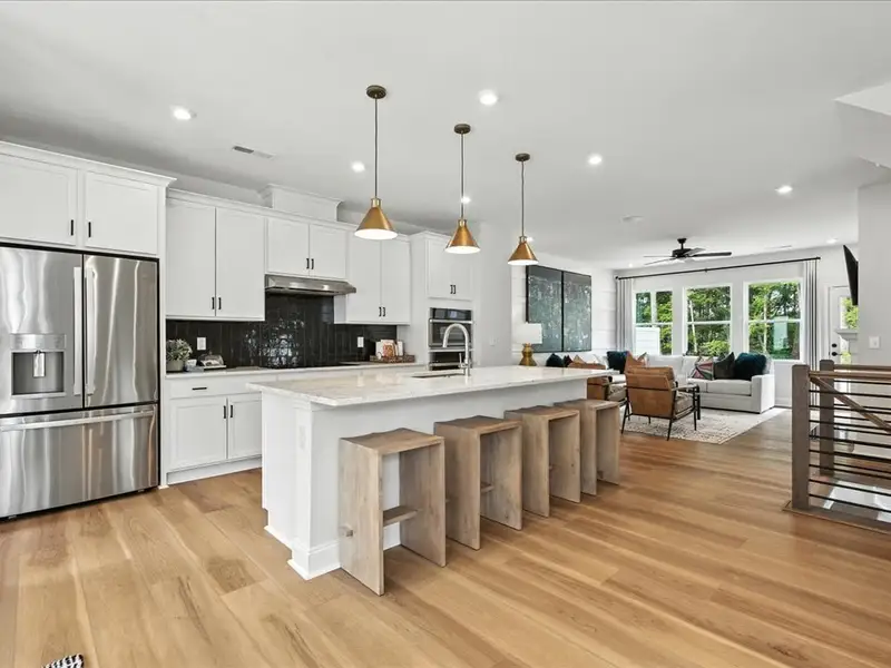 Furnished interior in a model home at Archer Row in Charlotte (Image 6).