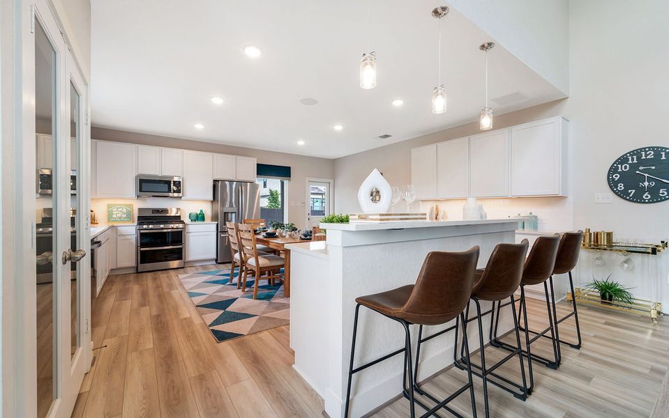 Furnished interior in a model home at Hunter's Ranch in San Antonio (Image 20).
