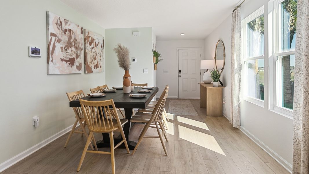 Furnished interior in a model home at Copes Landing in Jacksonville (Image 49).