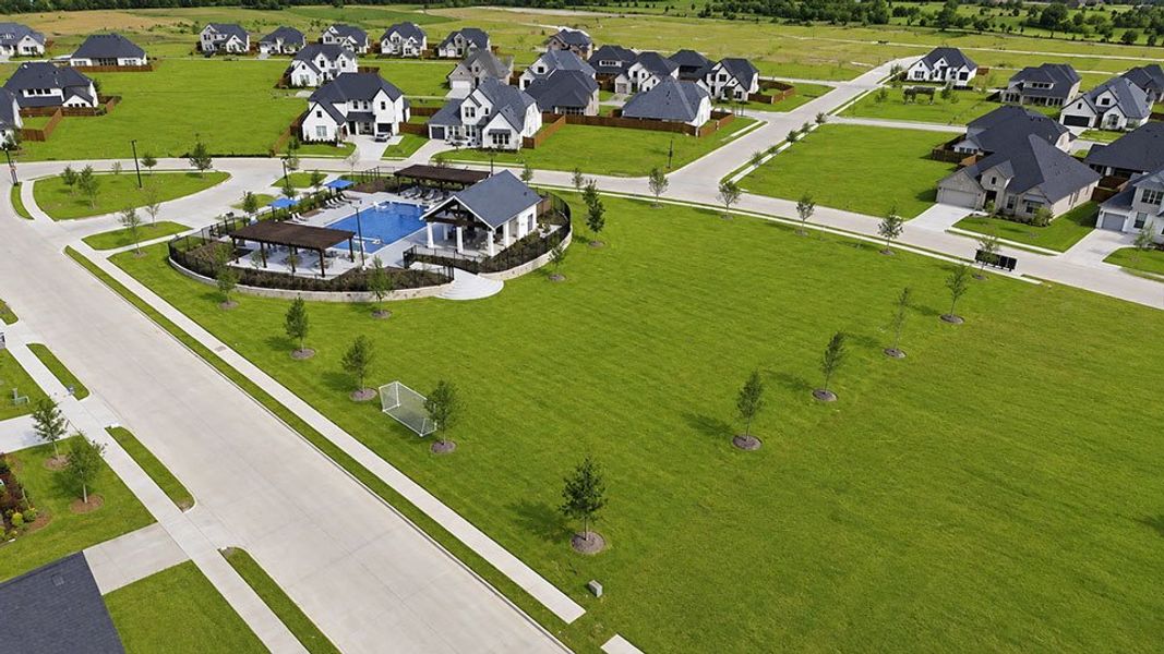 Aerial view of the The Homestead - 72' community in Rockwall, TX, showing layout and nearby surroundings (Image 13). Aerial view of the The Homestead - 72' community in Rockwall, TX, showing layout and nearby surroundings (Image 13).