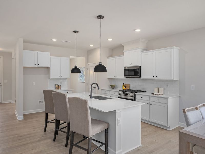 Furnished interior in a model home at Retreat at North Main in Lillington (Image 36).