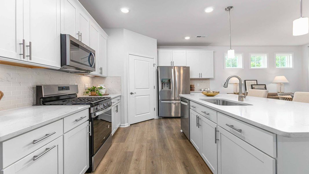 Furnished interior in a model home at The Villas at Kinsley in Jamestown (Image 14).