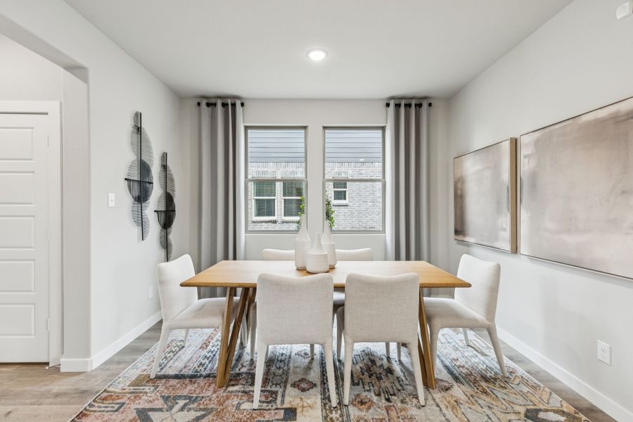 REPRESENTATIVE PHOTO – Dining Room in a Lakehaven Oak model home in Farmersville TX by Trophy Signature Homes