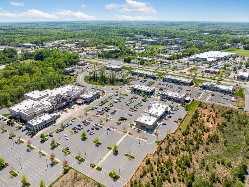 Aerial view of the Terraces at the Exchange community in Indian Land, SC, showing layout and nearby surroundings (Image 16). Aerial view of the Terraces at the Exchange community in Indian Land, SC, showing layout and nearby surroundings (Image 16).