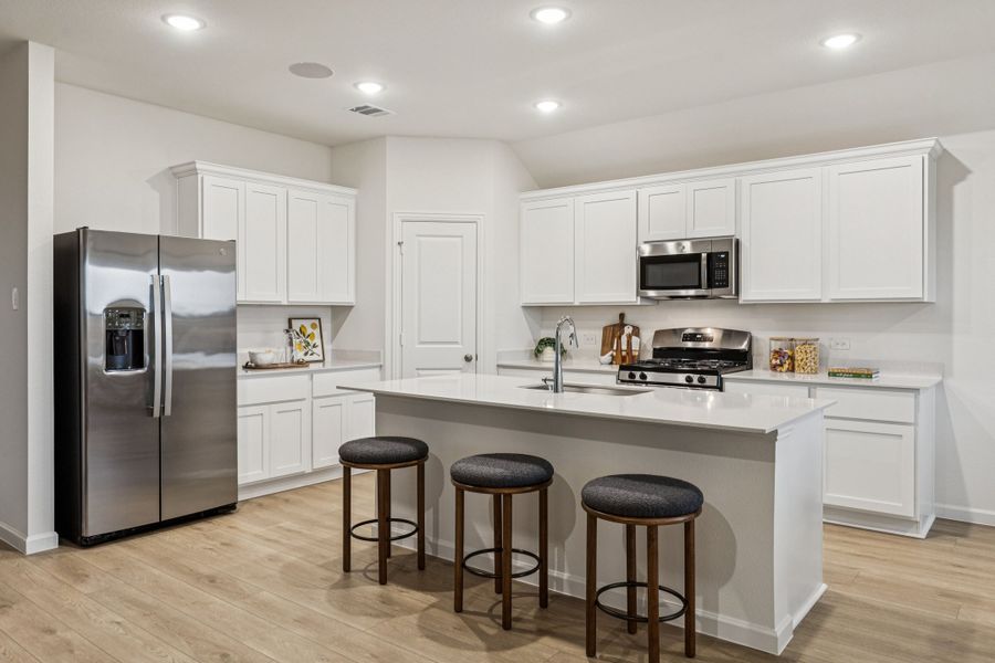 Furnished interior in a model home at Sunterra Lakes in Brookshire (Image 6). Furnished interior in a model home at Sunterra Lakes in Brookshire (Image 6).