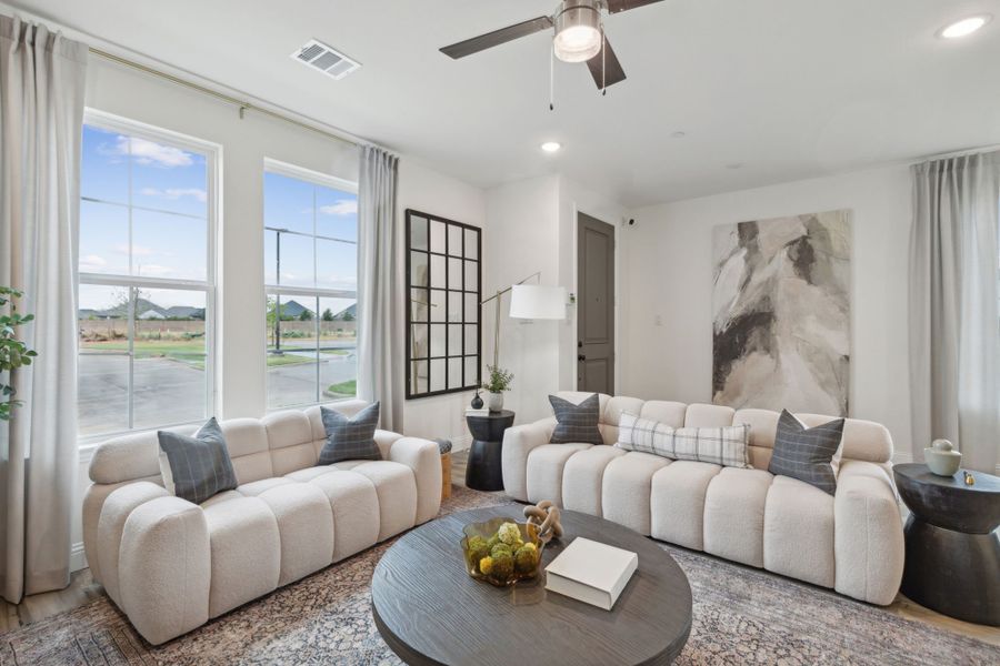 Furnished interior in a model home at Twin Creeks Watters in Allen (Image 10).