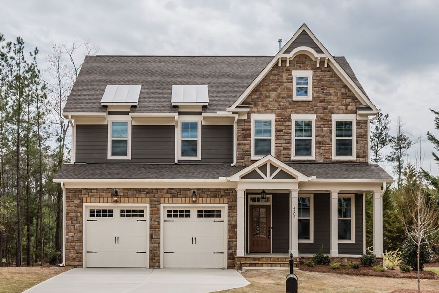Front exterior of a home in the Brighton Forest - Apex - Robuck Homes community, located in Garner, NC (Image 7).