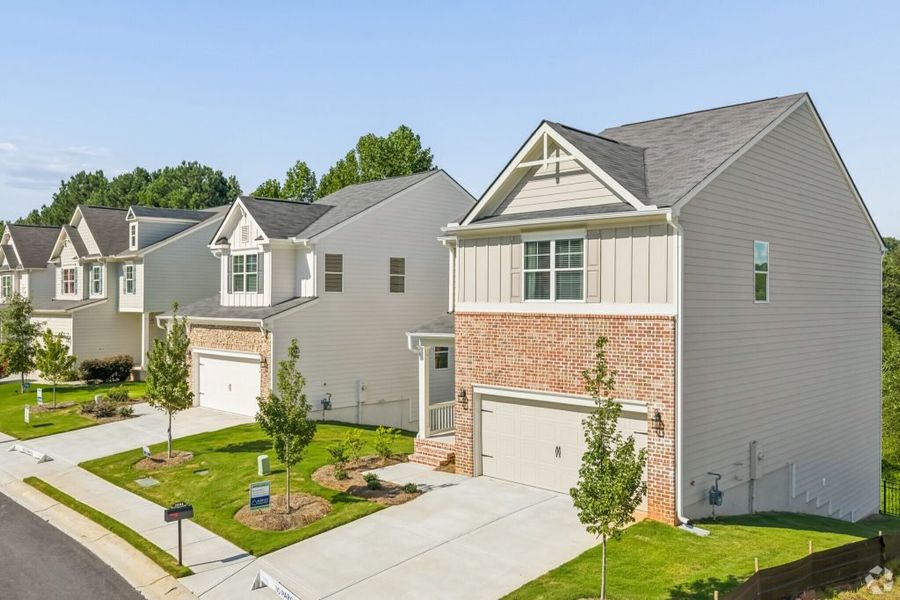 Front exterior of a home in the The View at Groover's Lake community, located in Lithia Springs, GA (Image 14).