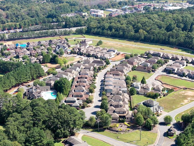 Aerial view of the The Village at Towne Lake community in Woodstock, GA, showing layout and nearby surroundings (Image 11).