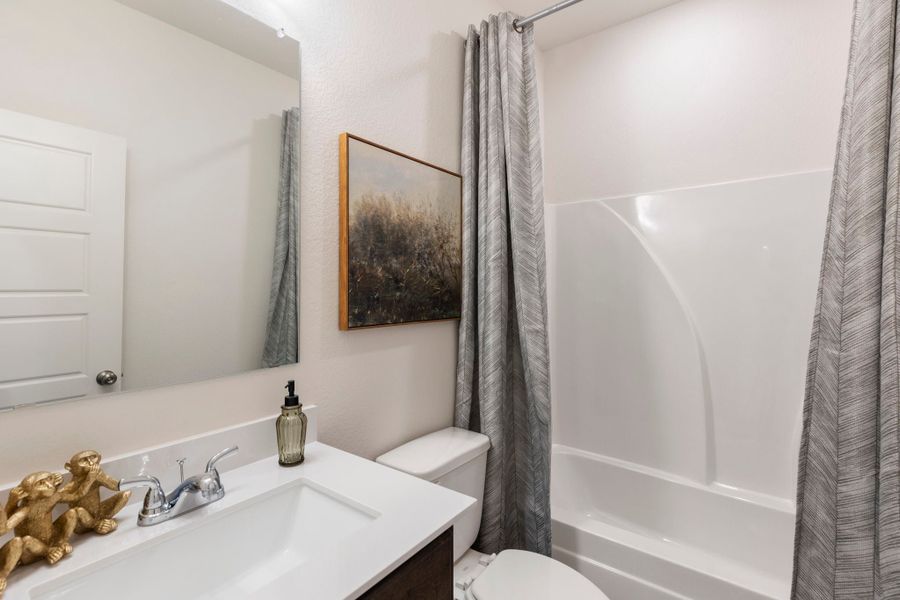 Furnished interior in a model home at Liberty Oaks in Waco (Image 13).