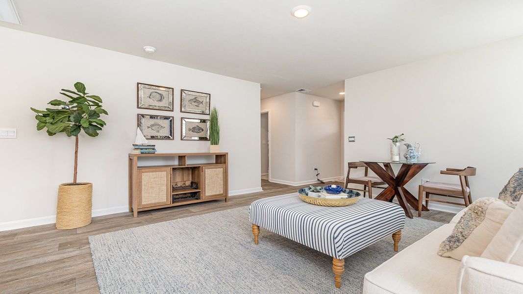 Furnished interior in a model home at Silver Oaks in Ocean Isle Beach (Image 8).