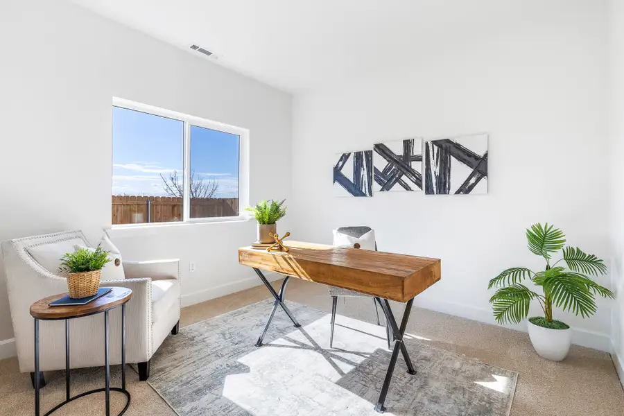 Furnished interior in a model home at Rosengarth Estates in Bend (Image 13).