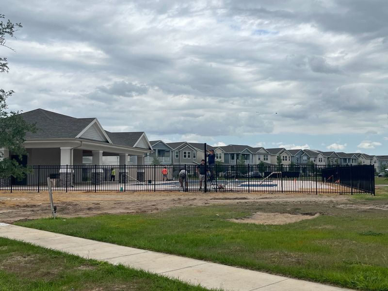 A developing community with amenities and modern homes in Harvest at Ovation - Townhomes by Rockwell Homes (Winter Garden, FL). A developing community with amenities and modern homes in Harvest at Ovation - Townhomes by Rockwell Homes (Winter Garden, FL).
