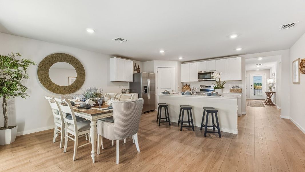 Furnished interior in a model home at Coral Lakes - Tradition & Express in Punta Gorda (Image 42).