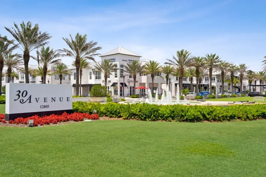 Entrance to the The Villas at Longleaf Park, a Watersound Origins® community community in Inlet Beach, FL, featuring signage and landscaping (Image 2).