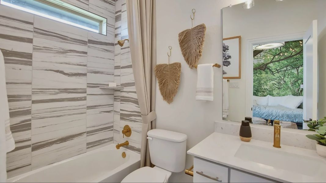 Furnished interior in a model home at Oaks at San Gabriel in Georgetown (Image 5).