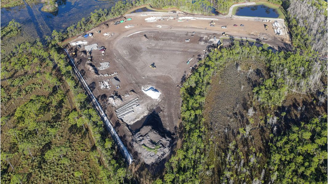Site preparation and early development at The Cove at Park Trace in Stuart, FL (Image 19).