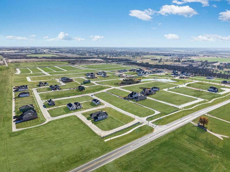 Aerial view of the The Ranch at Uptown Celina community in Celina, TX, showing layout and nearby surroundings (Image 8). Aerial view of the The Ranch at Uptown Celina community in Celina, TX, showing layout and nearby surroundings (Image 8).