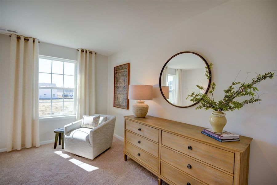 Furnished interior in a model home at Corinth Village in Greensboro (Image 5).