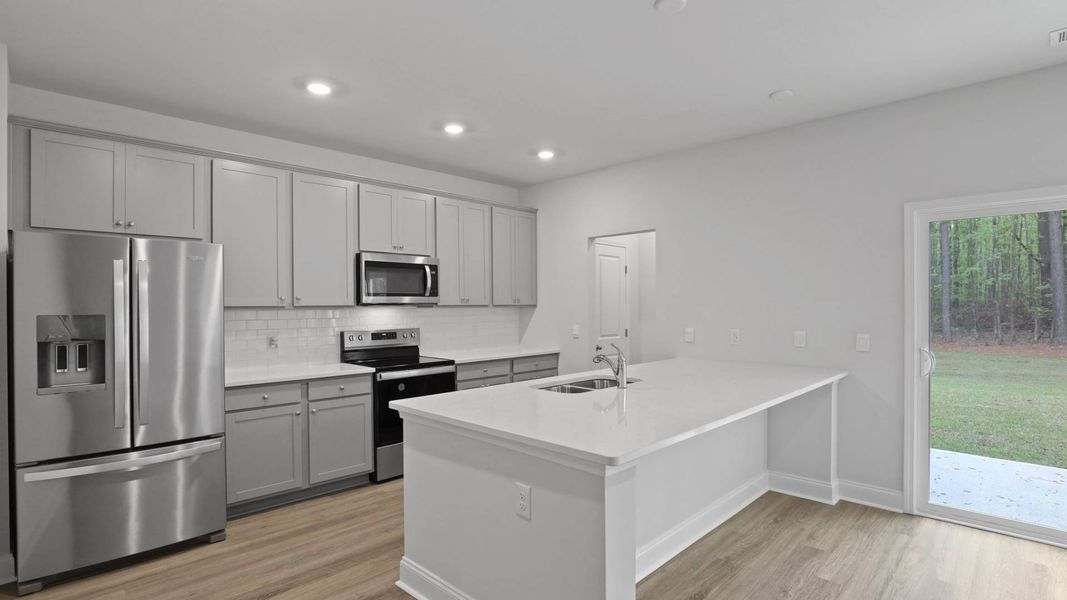 Furnished interior in a model home at Rivers Reach in Yemassee (Image 4).