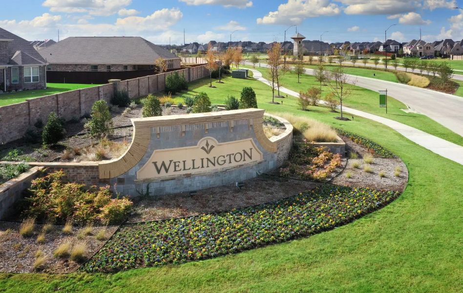Main entrance to the Wellington master-planned community in Fort Worth, TX, featuring its landmark signage (Image 2). Main entrance to the Wellington master-planned community in Fort Worth, TX, featuring its landmark signage (Image 2).