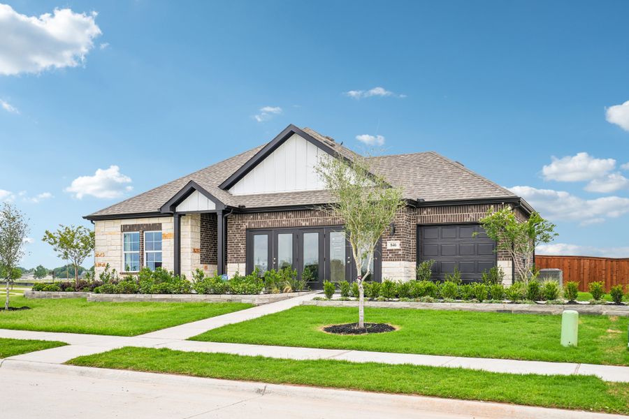 A house with a large front yard.