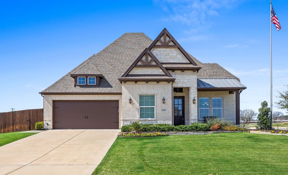 Front exterior of a home in the Coyote Crossing community, located in Godley, TX (Image 3).