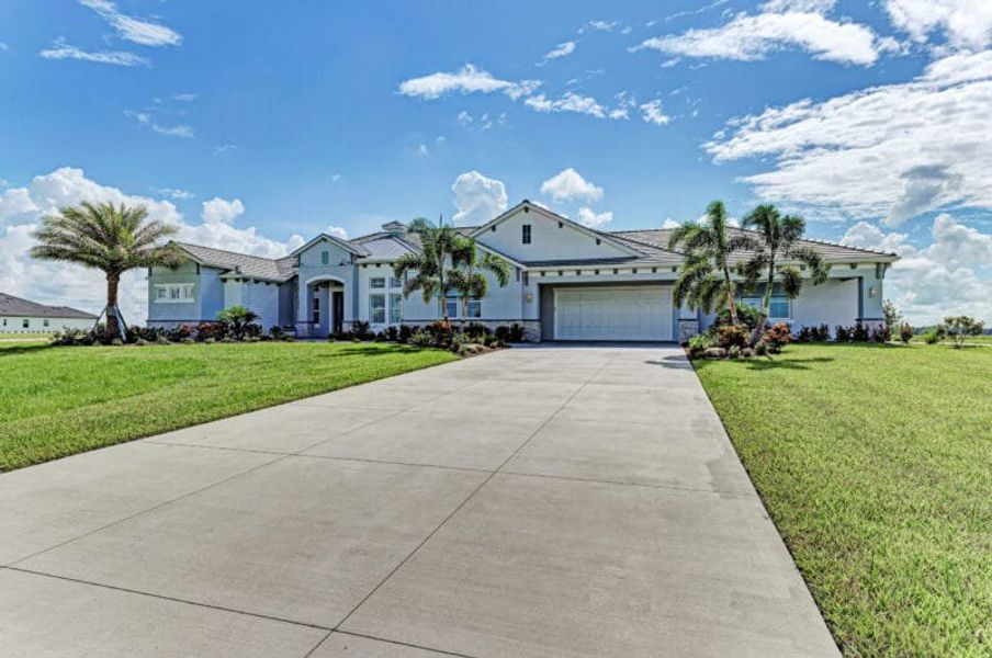 Front exterior of a home in the Hampton Lakes community, located in Sarasota, FL (Image 32). Front exterior of a home in the Hampton Lakes community, located in Sarasota, FL (Image 32).