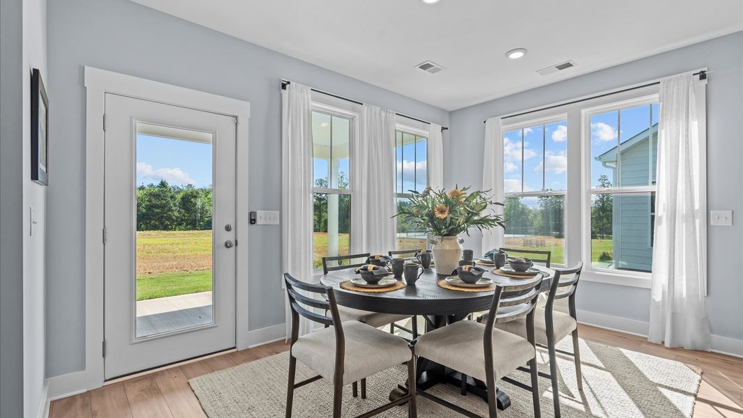 Furnished interior in a model home at Wells Crossing in Seneca (Image 32).