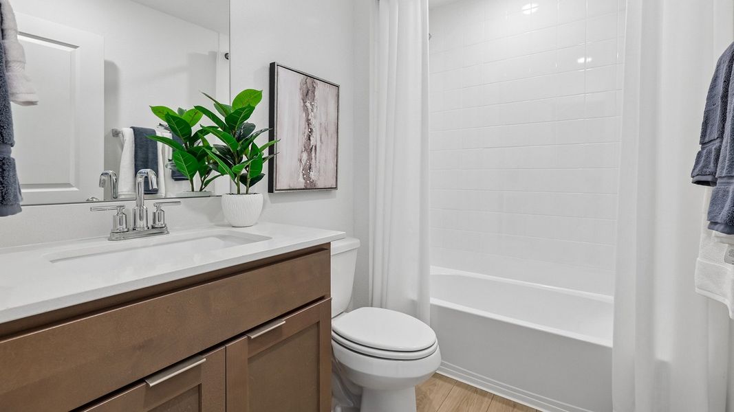 Furnished interior in a model home at Monarch Ranch in Manor (Image 41).