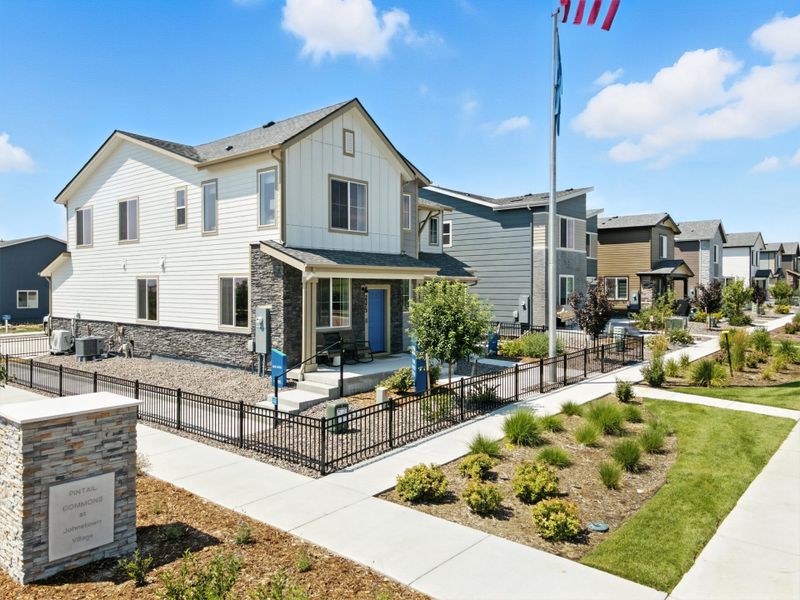 Front exterior of a home in the Pintail Commons at Johnstown Village community, located in Johnstown, CO (Image 12). Front exterior of a home in the Pintail Commons at Johnstown Village community, located in Johnstown, CO (Image 12).