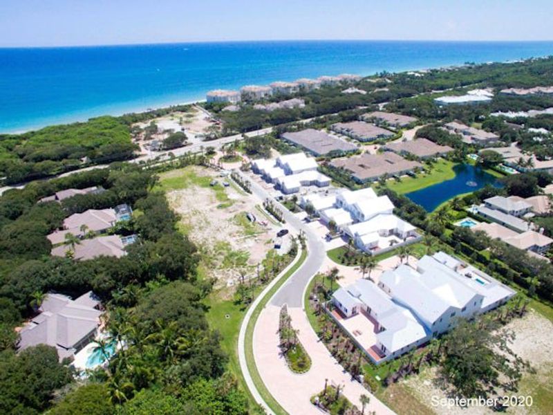 Aerial view of the The Strand community in Vero Beach, FL, showing layout and nearby surroundings (Image 56).