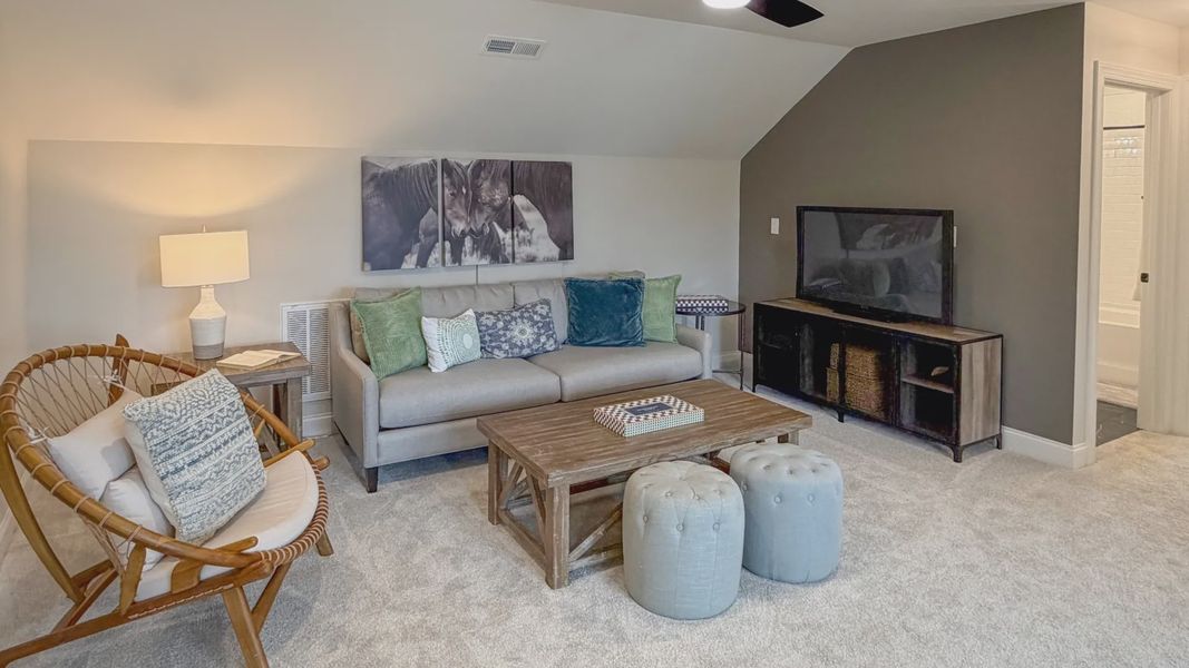 Furnished interior in a model home at The Courtyards at Hodges Farm in Charlotte (Image 30).