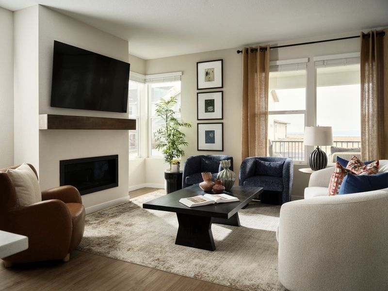 Furnished interior in a model home at Novella at Barefoot in Firestone (Image 7).