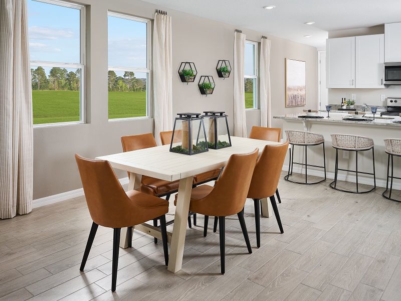 Dining area of the Acadia floorplan modeled at Park East.